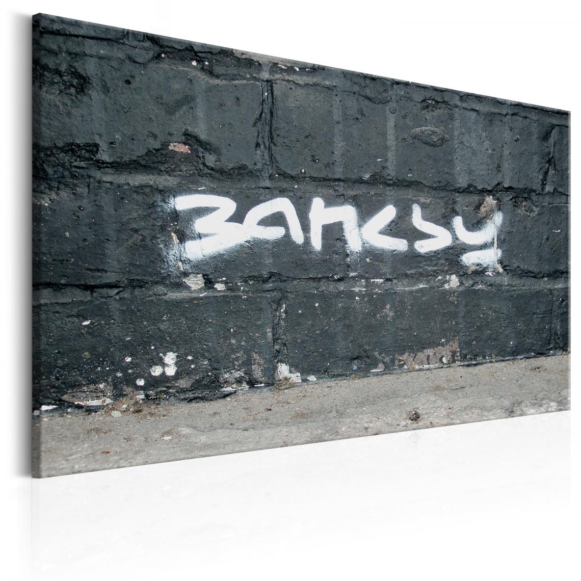 Decoshop26 - Tableau sur toile décoration murale image imprimée cadre en bois à suspendre Signature de Banksy 90x60 cm 11_0003377 - Tableaux, peintures