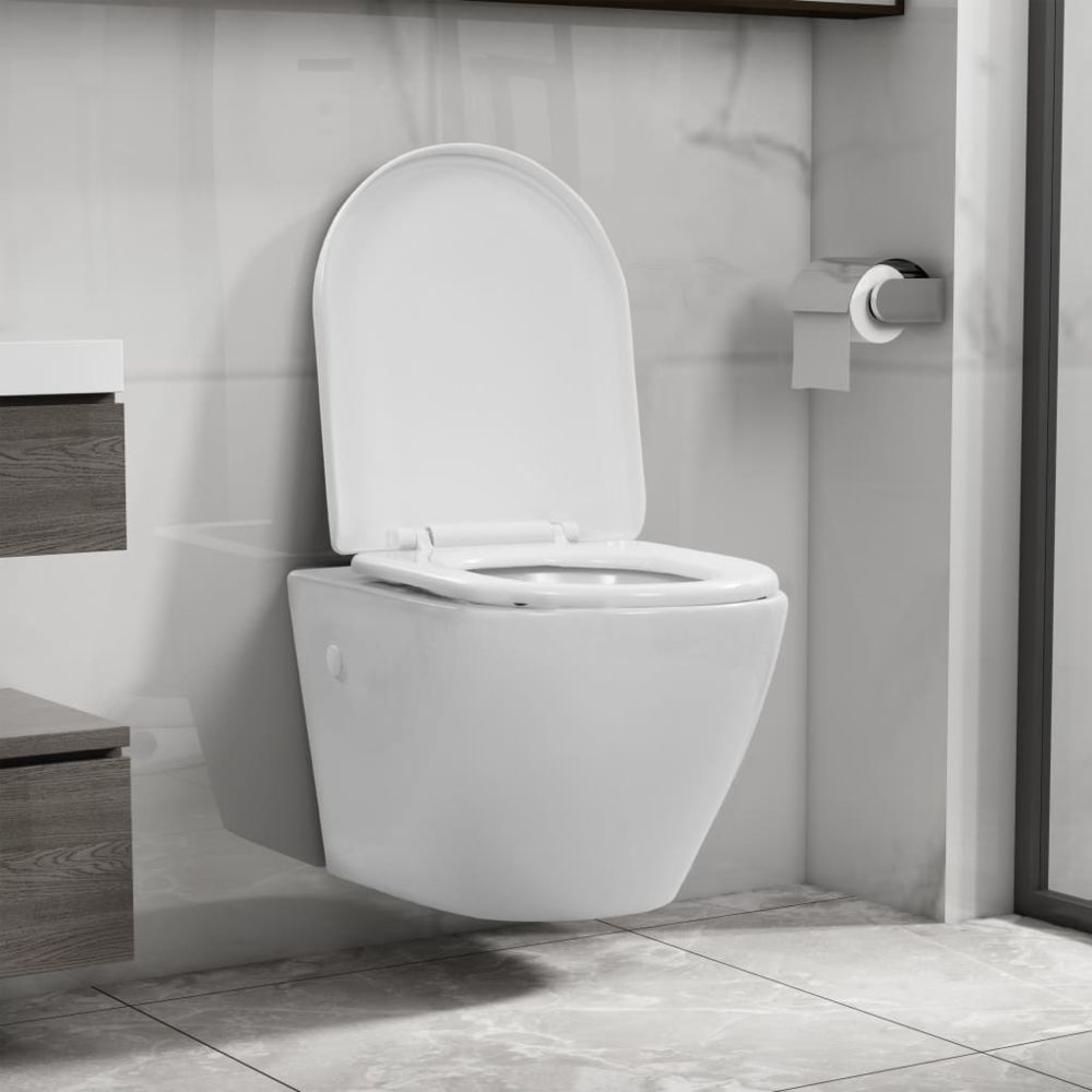 Vidaxl - vidaXL Toilette suspendue au mur sans rebord Céramique Blanc - WC