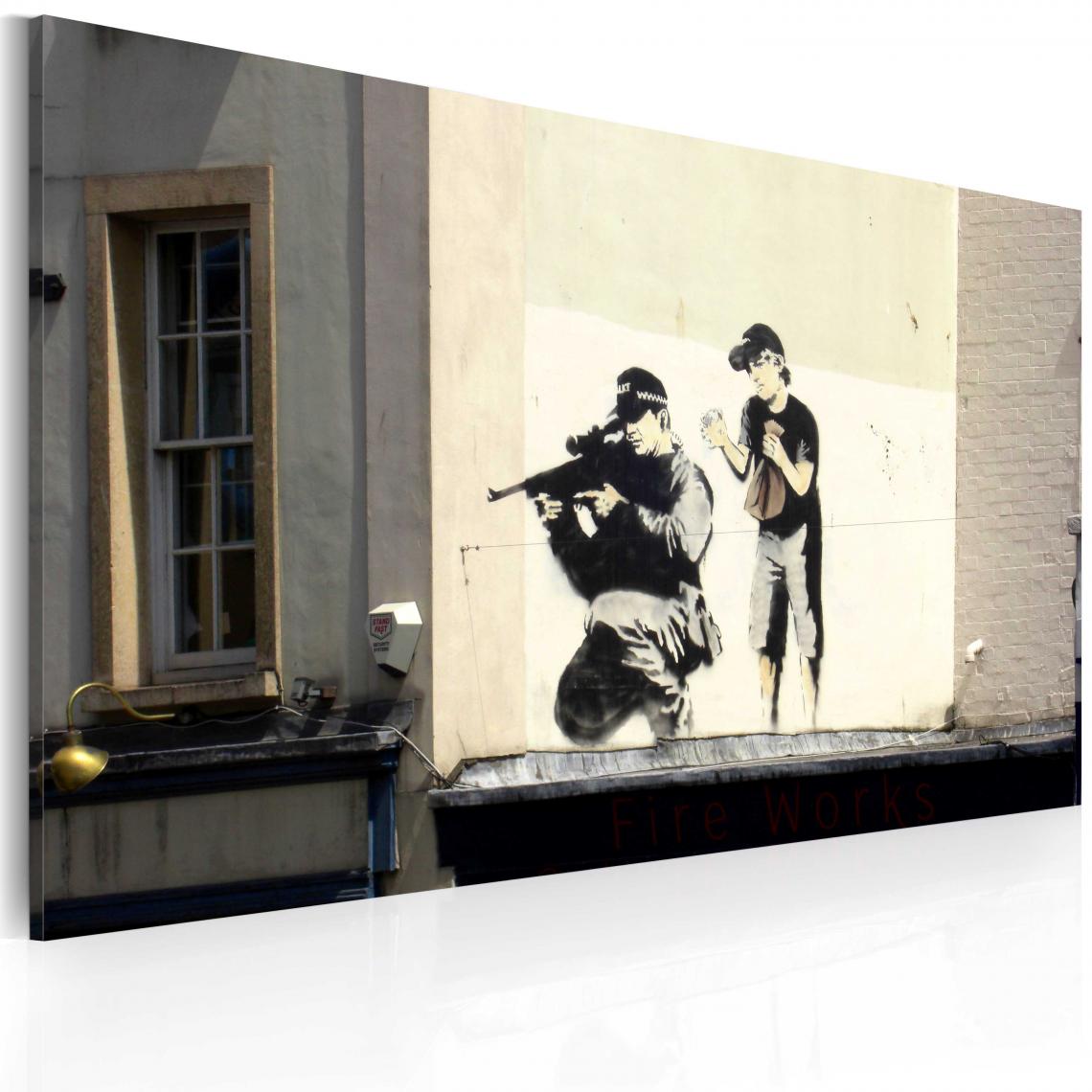 Decoshop26 - Tableau sur toile décoration murale image imprimée cadre en bois à suspendre Tireur et garçon (Banksy) 60x40 cm 11_0003269 - Tableaux, peintures
