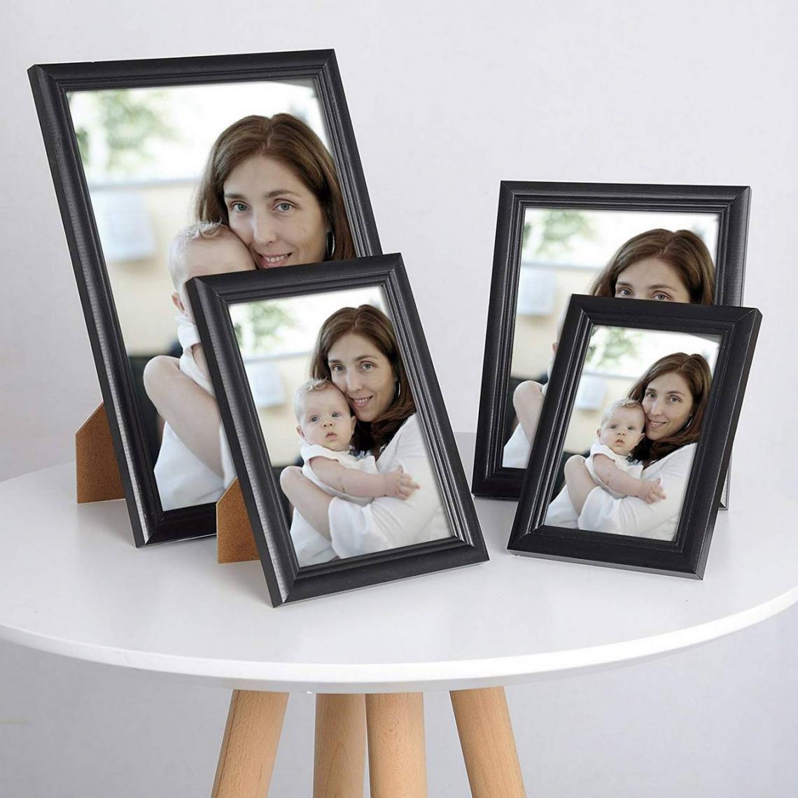 MercatoXL - cadre photo en bois et réelle lentille en verre avec un style Artos noir A4 21x29,7cm - Photophores